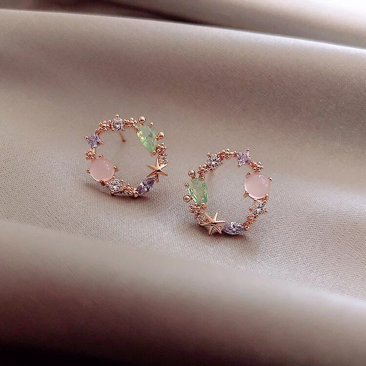 Pendientes florales de cristal en oro rosa