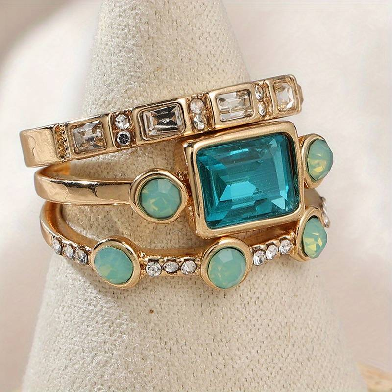 Juego de anillos de cristal azul vintage