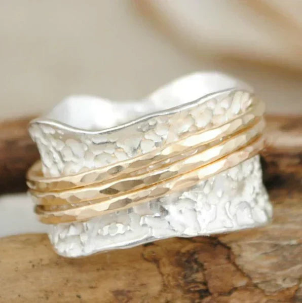 Anillo giratorio fino vintage en oro y plata