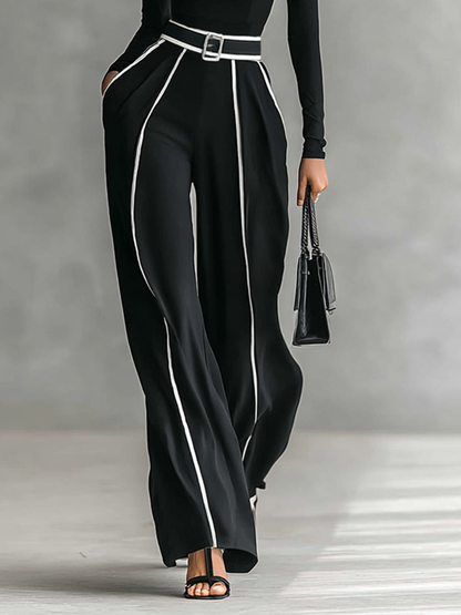 Conjunto de dos piezas: camiseta de manga larga, pantalón ancho y cinturón.