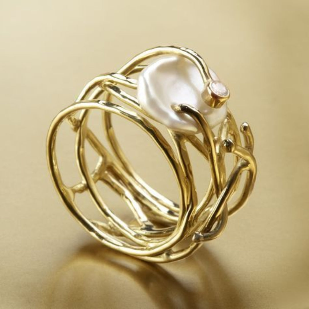 Anillo de oro vintage con perla fina 