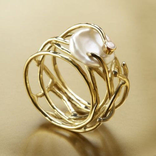 Anillo de oro vintage con perla fina 