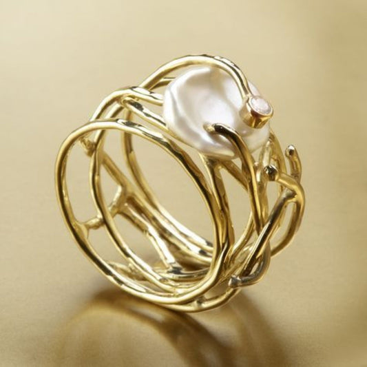 Anillo de oro vintage con perla fina 