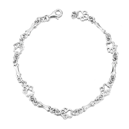 Pulsera con dijes de pata de perro y hueso en plata
