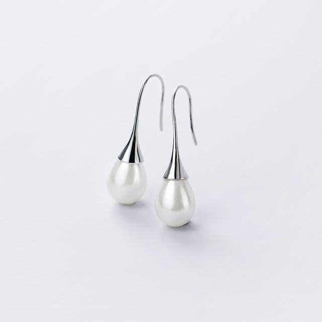 Pendientes colgantes con perlas 