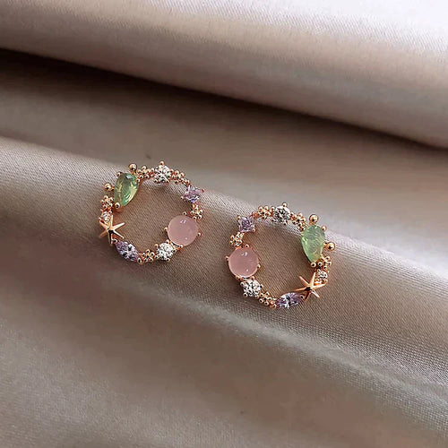 Pendientes florales de cristal en oro rosa