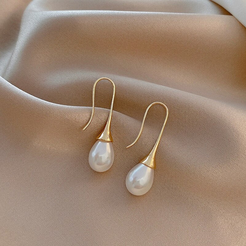 Pendientes colgantes con perlas 