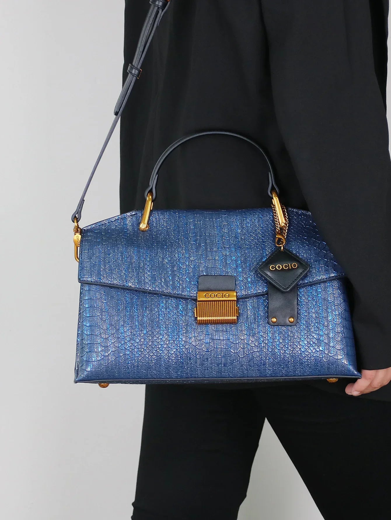 Bolso Celeste Python 