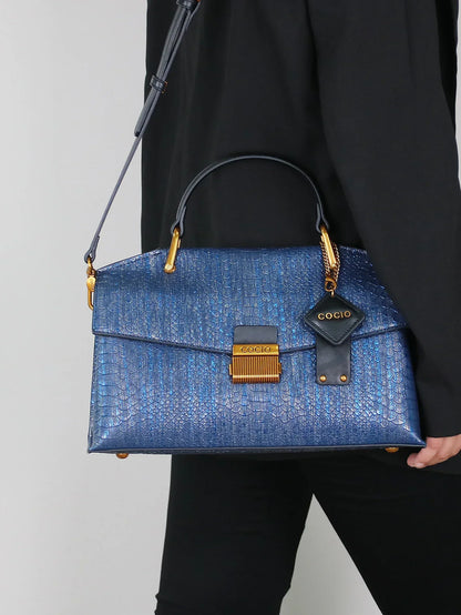 Bolso Celeste Python 