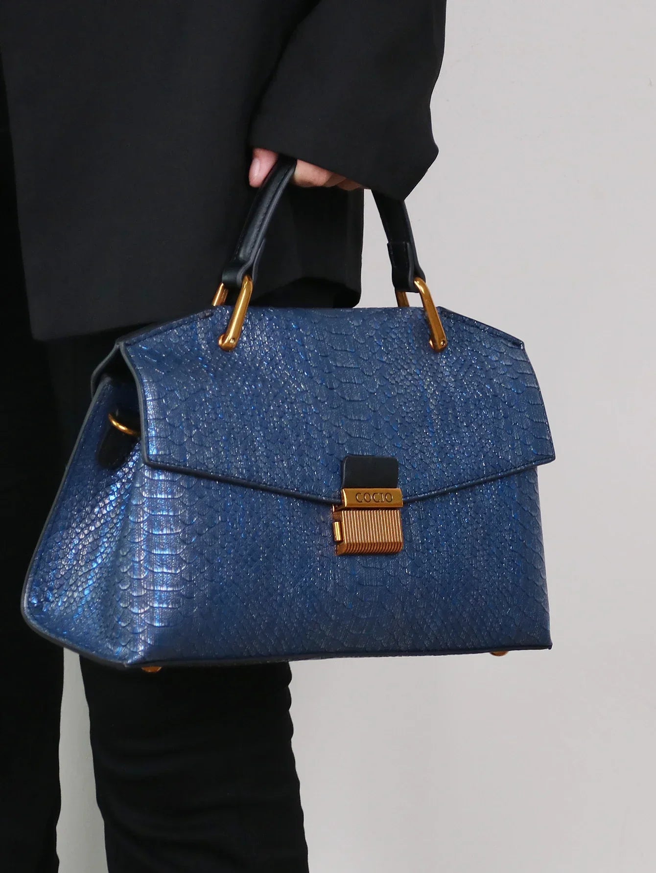Bolso Celeste Python 