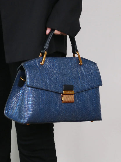 Bolso Celeste Python 