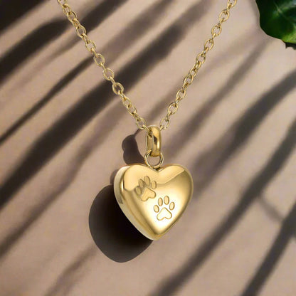 Collar con urna conmemorativa para mascotas: colgante en forma de corazón con huella de pata grabada