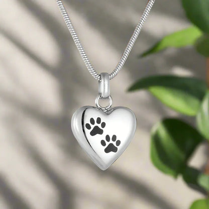 Collar con urna conmemorativa para mascotas: colgante en forma de corazón con huella de pata grabada
