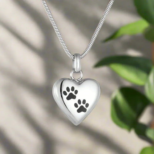 Collar con urna conmemorativa para mascotas: colgante en forma de corazón con huella de pata grabada