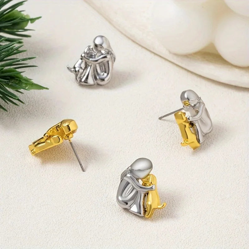Pendientes de abrazo bicolor de plata y oro