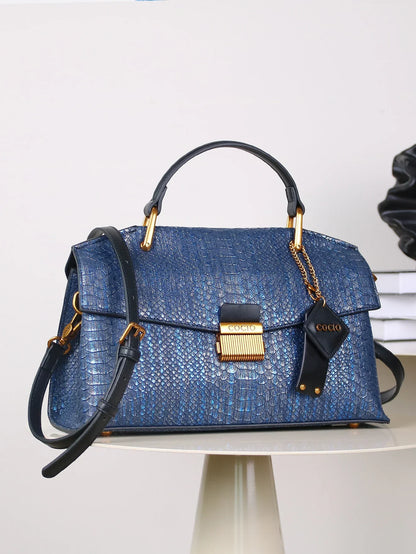 Bolso Celeste Python 