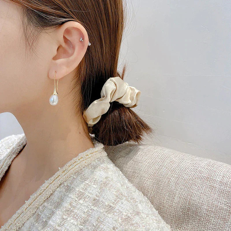 Pendientes colgantes con perlas 