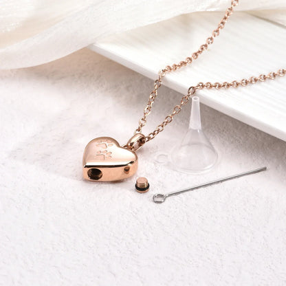 Collar con urna conmemorativa para mascotas: colgante en forma de corazón con huella de pata grabada