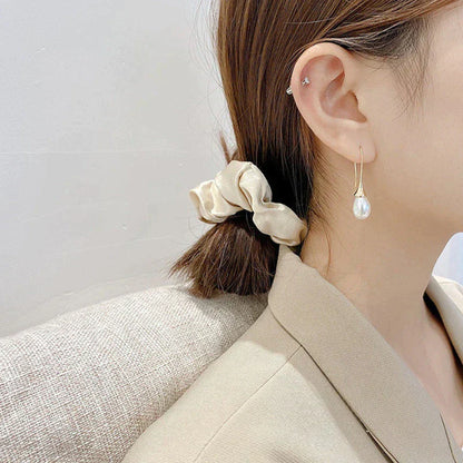 Pendientes colgantes con perlas 