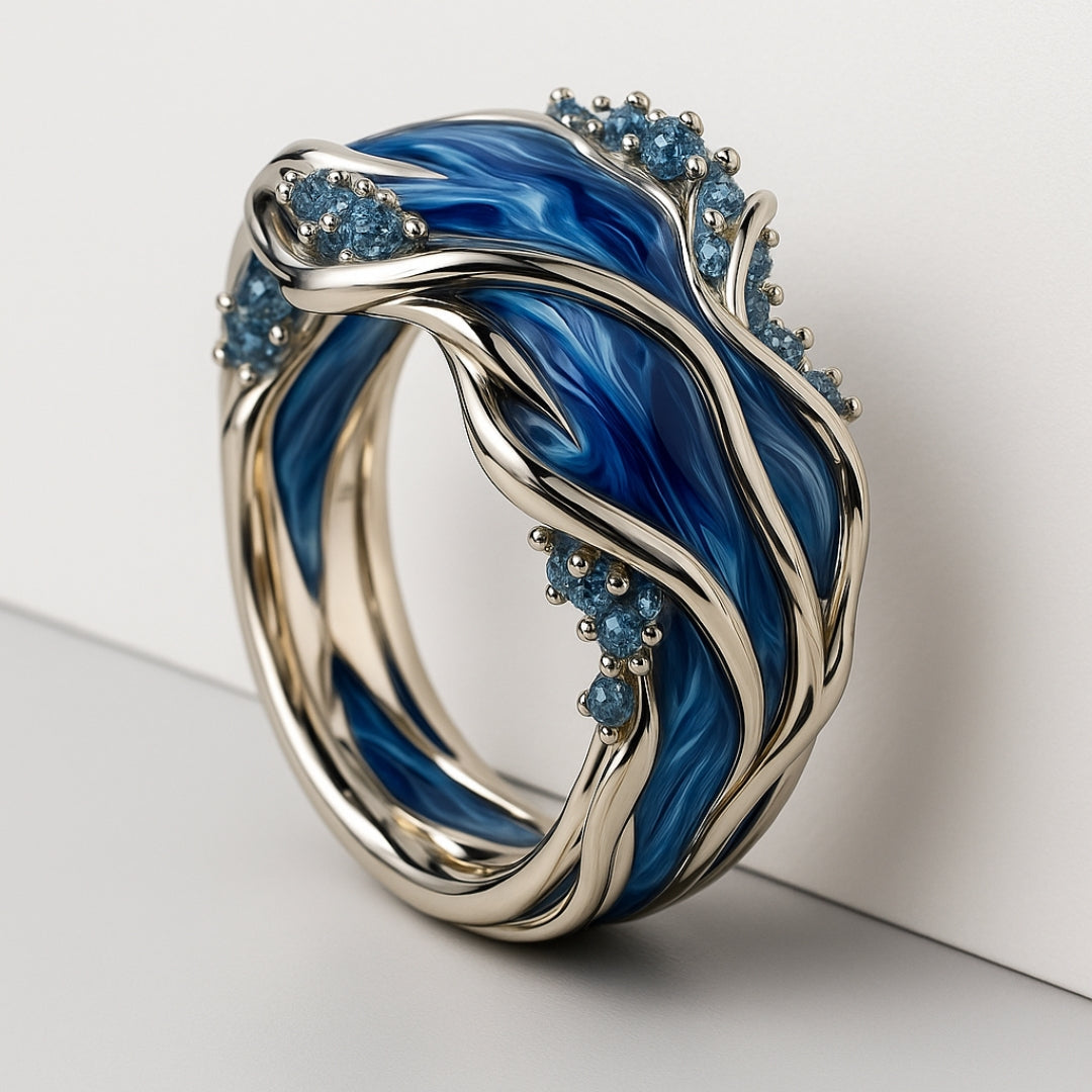 Anillo vintage dorado con ondas oceánicas