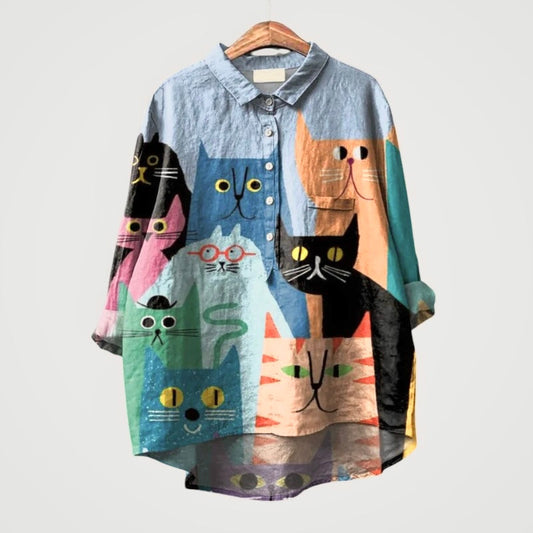 Daisy | Blusa oversize con gatos coloridos y comodidad instantánea para tus días casuales 