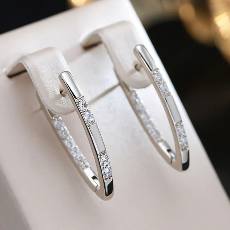 Elegantes pendientes de circonita en oro