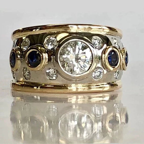 Anillo de oro vintage con circonitas engastadas 