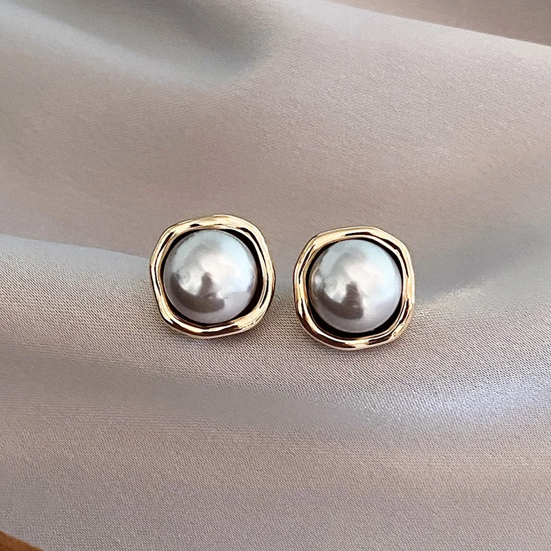 Pendientes elegantes con perla negra 
