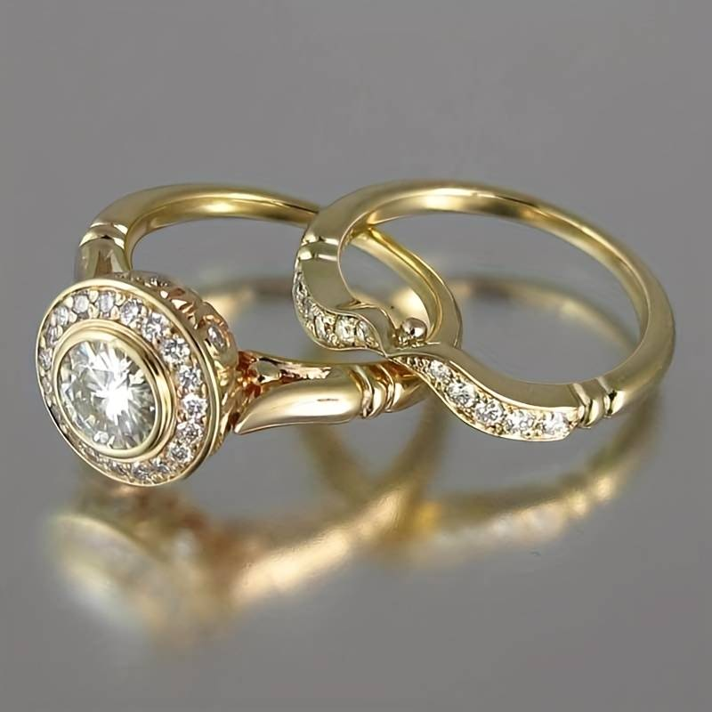 Anillo vintage de oro y circonitas 