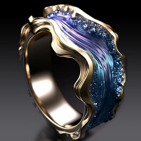 Anillo vintage dorado del océano