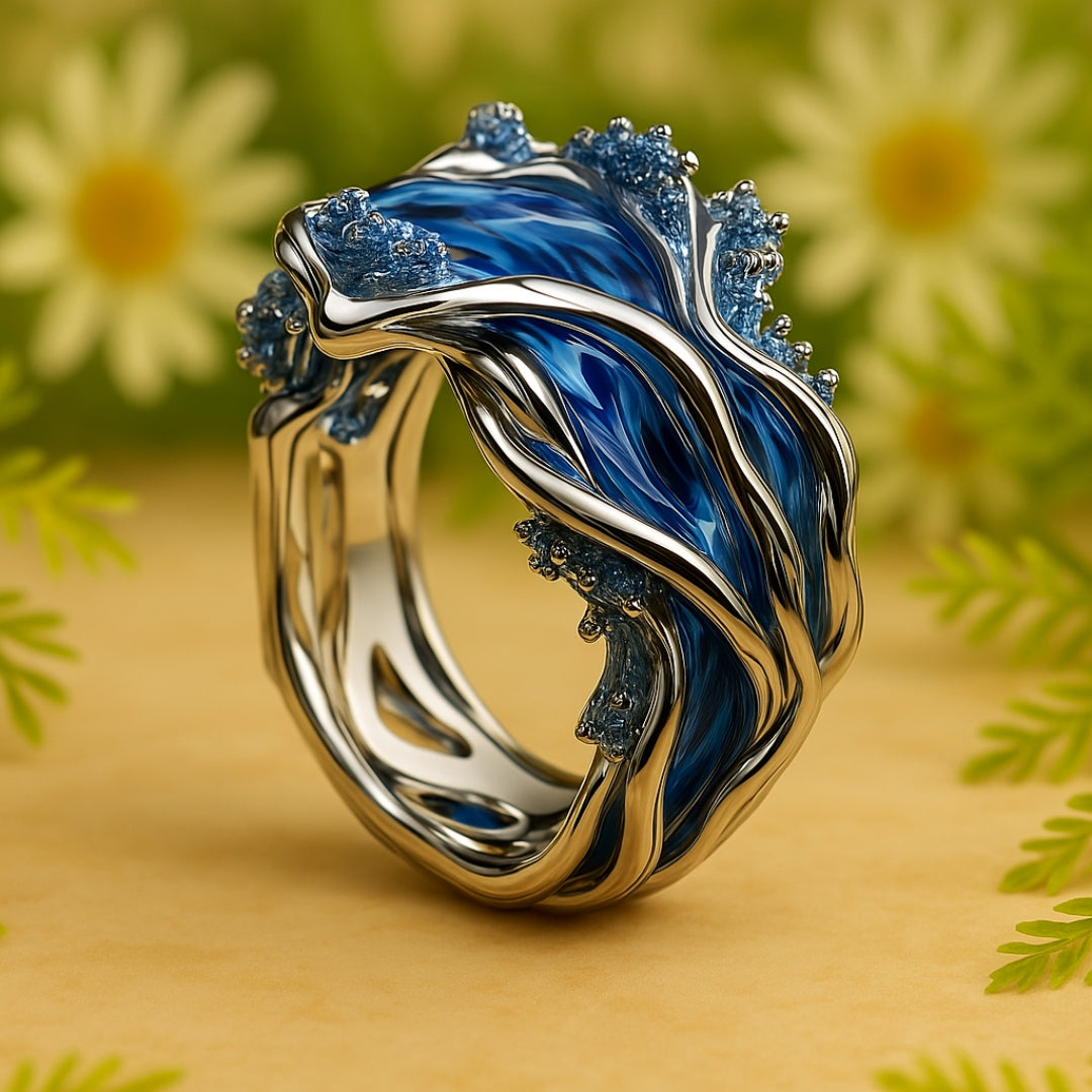 Anillo vintage dorado con ondas oceánicas