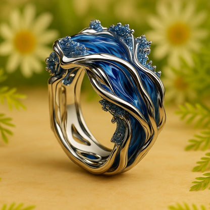 Anillo vintage dorado con ondas oceánicas