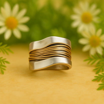 Anillo de plata con hilos dorados