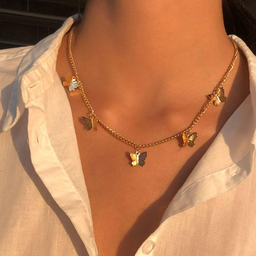 Collar de mariposa bañado en plata y oro